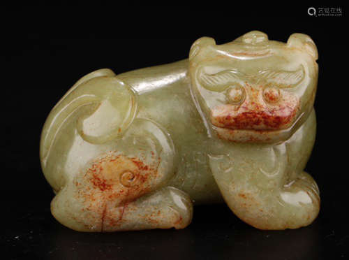 A HETIAN YELLOW JADE BEAST PENDANT