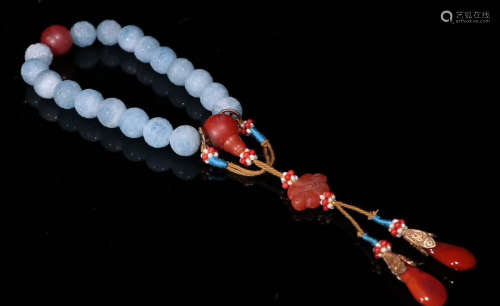 A JADE STRING BRACELET WITH 18 BEADS
