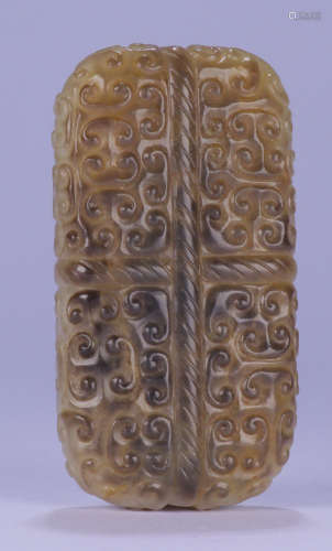 AN ANTIQUE JADE TABLET CARVED WITH BEAST PATTERN