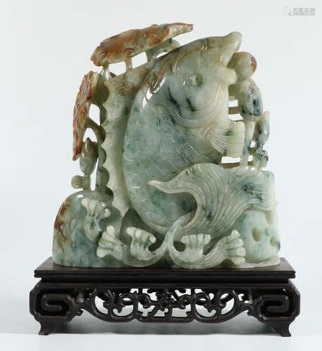 A JADEITE ORNAMENT SHAPED WITH FISH