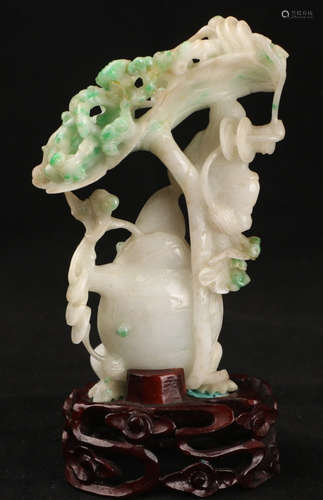 A JADEITE FIGURE ORNAMENT