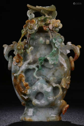 A JADEITE VASE CARVED WITH PLUM FLOWER