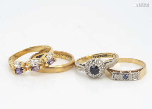 A 22ct gold gem set wedding band, ring size L, 3.3g together with two 18ct gold gem set dress rings,