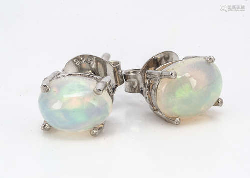 A pair of white Ethiopian opal ear studs in silver