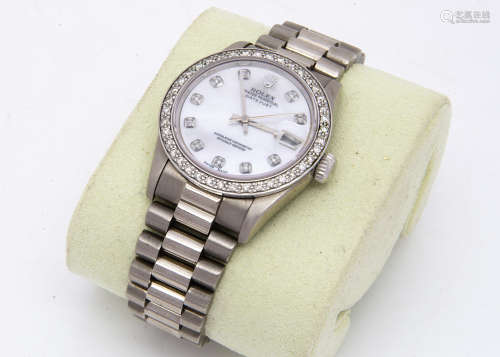 A Rolex Datejust 18ct white gold and diamond lady's wristwatch, 31mm case, having diamond dot