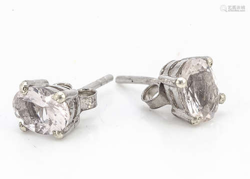 A pair of morganite oval mixed cut silver set ear studs