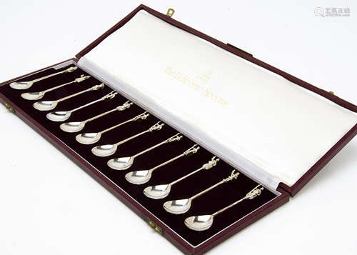 A 1970s set of the Tichborne Spoons, the welve each with figure to terminal, in box with