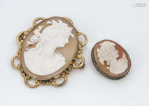 A 19th Century shell cameo oval brooch, with carved profile of a classical maiden with flowers in