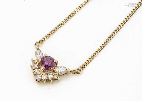 An 18ct yellow gold ruby and diamond necklace, claw set heart shaped ruby surrounded by marquise cut