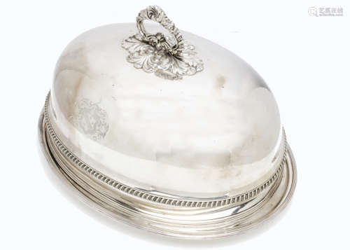 An Edwardian period silver plated meat dish cover, with engraved family crest to each side, together
