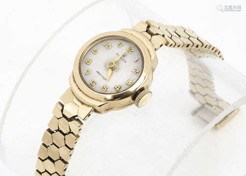 A c1960s Rolex 9ct gold lady's wristwatch, 16mm case on an integrated 9ct gold Rolex clasped