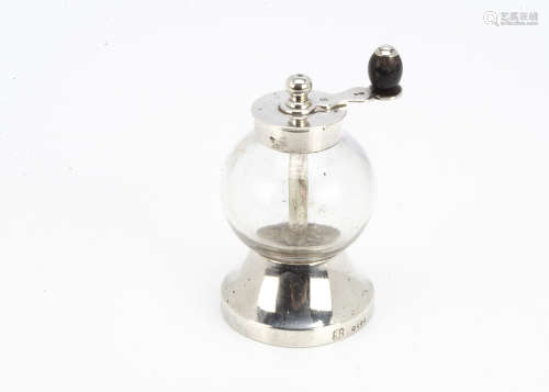 A Victorian glass and silver pepper mill by Hukin & Heath, with glass spherical well and flared