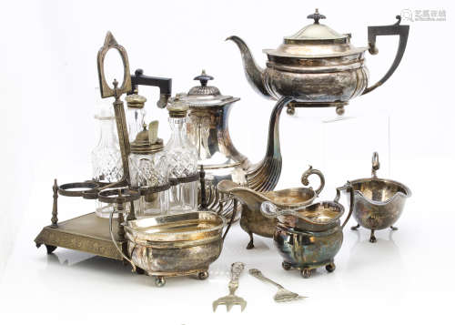 A collection of silver plate, including a Hukin & Heath coffee pot, a candelabra, tea set, and more