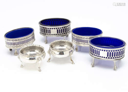 Three pairs of George III silver salts, twin oval pierced neo-classical, one with blue glass liners,