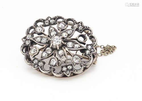 A Victorian oval gold and silver set diamond brooch, the old cut diamonds in a floral setting