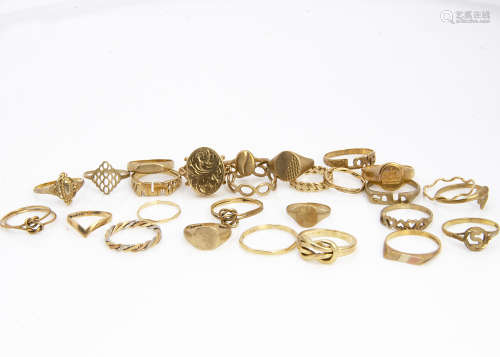 A collection of twenty six 9ct gold dress rings, including lady's signet rings, hinged locket