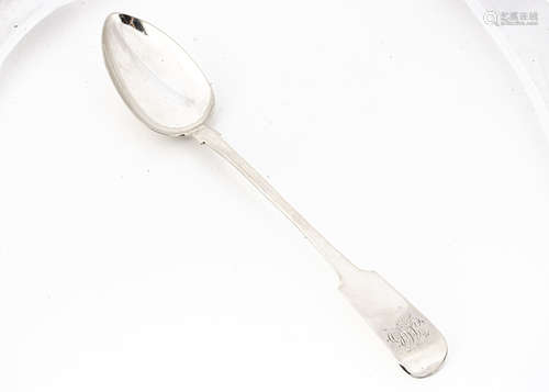 A William IV silver basting spoon by William Woodman, Exeter 1836, fiddle pattern with engraved