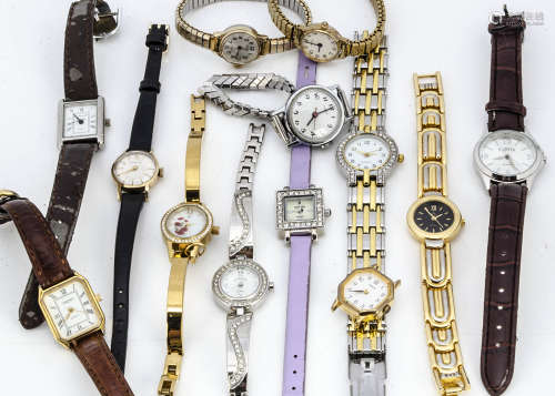 A small collection of ladies wristwatches, including a 9ct gold cased Garrard example, a Timex and