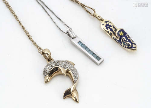 A 9ct gold and diamond dolphin pendant, together with a 9ct gold topaz drop pendant and a
