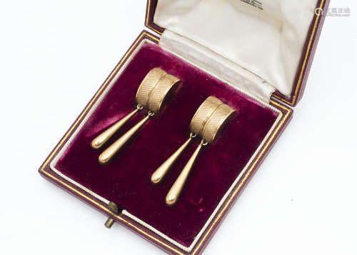 A pair of 9ct gold Garrard & Co Art Deco engine turned and oval baton drop clip earrings, in