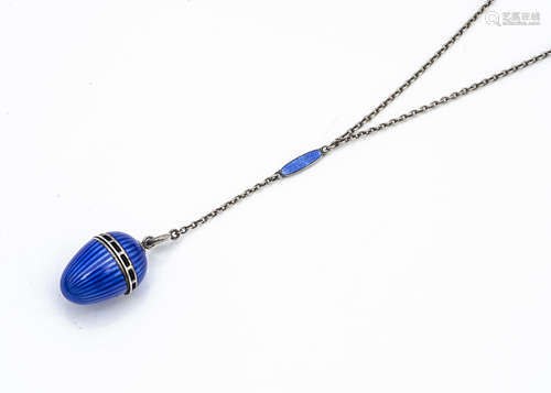 A continental white metal guilloche enamel perfume pendant and chain, the egg shaped pendant with