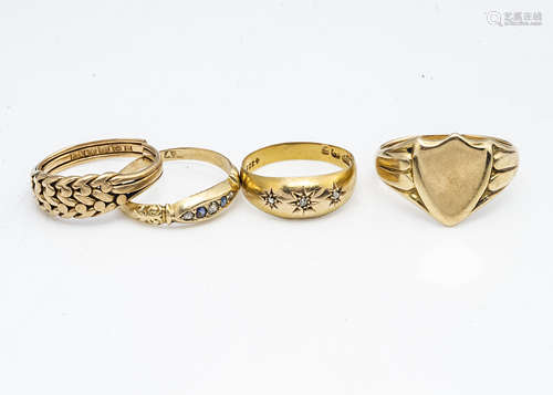 A collection of gold rings, including four 18ct gold rings, comprising a lady's keepers ring, af,