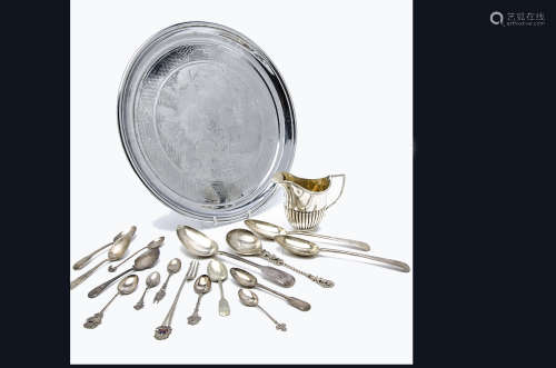A small group of silver and silver plate, including a silver milk jug, pair of silver tablespoons,