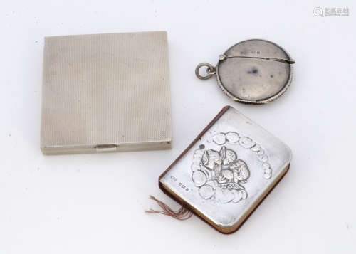 An Art Deco period silver square compact, together with a silver circular vesta case, an Edwardian