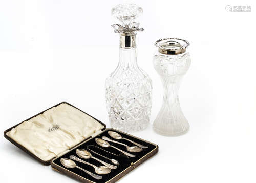 An early George V cut glass and silver mounted decanter and stopper, together with a cut glass and