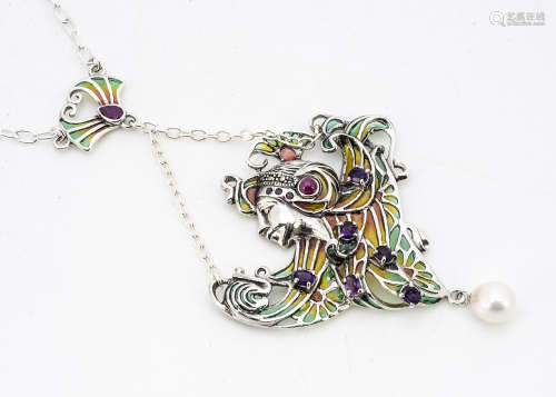 An Art Nouveau style Alphonse Mucha inspired enamel gem set pendant and chain, of femme fatale, 32cm