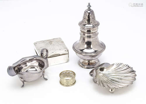 An Art Deco silver cigarette box, together with a silver plated sugar sifter, napkin ring, shell