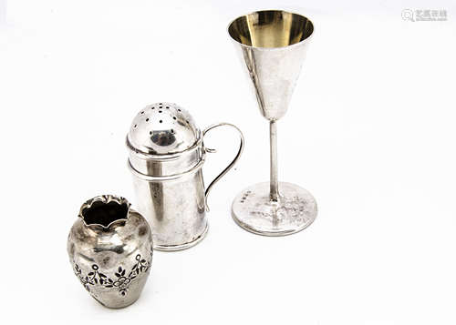 Three small collectable silver items, including an 800 marked continental goblet, a pepper shaker