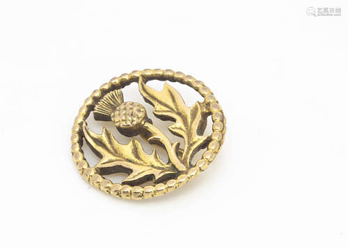 A 9ct gold iona pin brooch, by John Heart decorated with thistle design within a rope twist