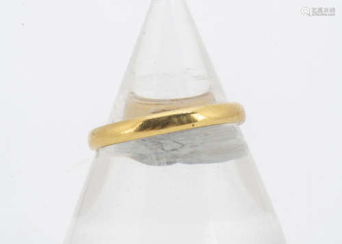 A 22ct gold wedding band, ring size P, 3g
