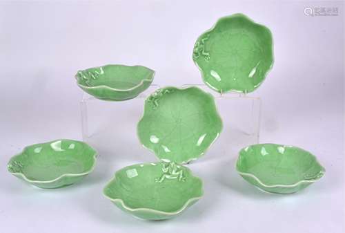 A set of six contemporary green glazed porcelain bowls, as lily leaves with moulded frog design,