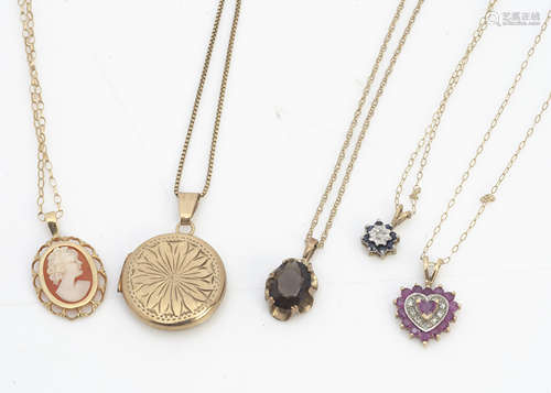 A collection of 9ct gold pendants, including lockets, ruby and diamond heart pendant, cameo pendant,