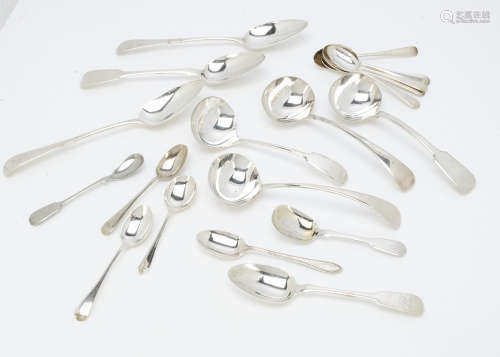 A small collection of silver and silver plated spoons, including a set of six George V old English