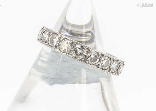 A diamond full eternity band, in white metal, channel set brilliant cuts, ring size L, 4.7g,