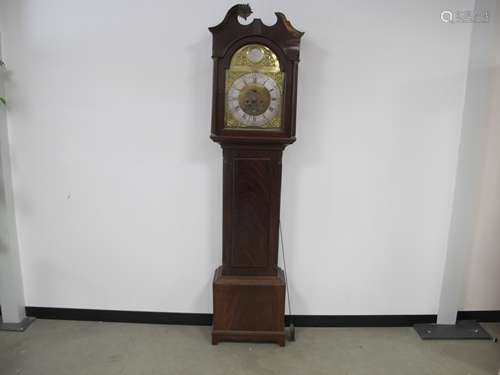 A Victorian mahogany long case clock, brass dial with silver chapter ring and having seconds