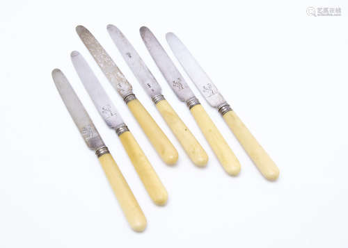 A set of George III silver and ivory handled dessert knives by Moses Brent, London 1804, bearing