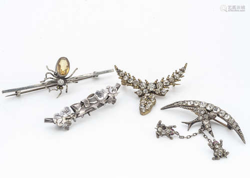 A silver and paste set swallow and frog brooch, the Chester marked silver brooch with a swallow on a