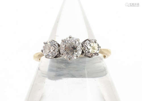 An old cut three stone diamond ring, in claw settings, yellow metal shank, possibly 18ct gold,