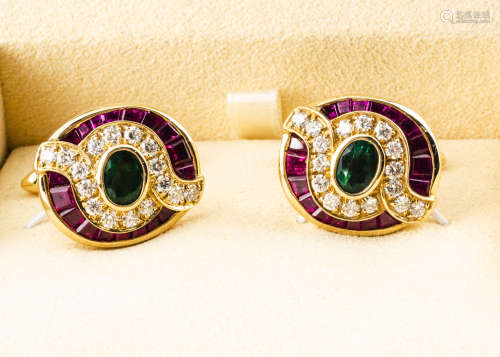 A pair of 18ct gold emerald, diamond and ruby cufflinks, in the colours of the Oman flag, of oval