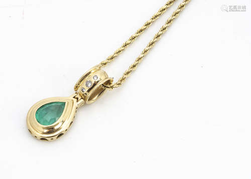 An emerald and diamond 18ct gold pendant and chain, the pear shaped emerald in rubbed over stepped