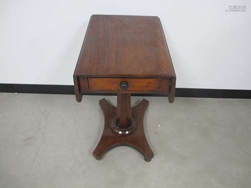 A William IV mahogany work table, single drawer with dummy to other side, drop leaves, on tapered