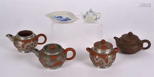 A group of predominantly Chinese Yixing stoneware, to include a teapot with cockerel finial, a