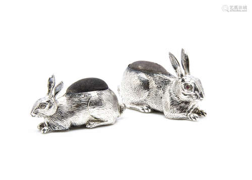 Two Edwardian period silver pin cushions, modelled as recumbent rabbits, 6.5cm and 5.7cm (2), good