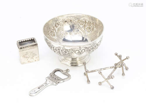 A late Victorian silver footed bowl by Martin Hall & Co, together with a pair of silver knife rests,