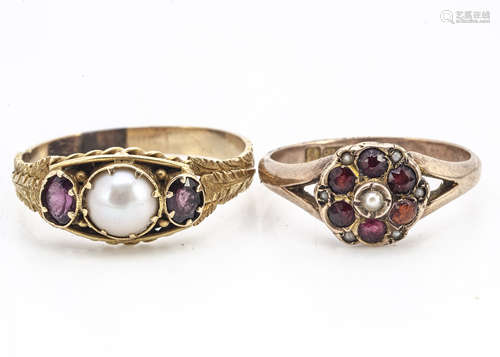 An antique almandine garnet and pearl ring, the claw set gemstones in an oval rope twist setting