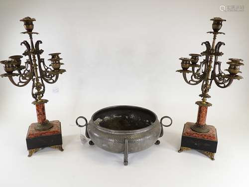 A pair of 19th Century four branch brass candelabra, raised on marble block, plinth and four feet,